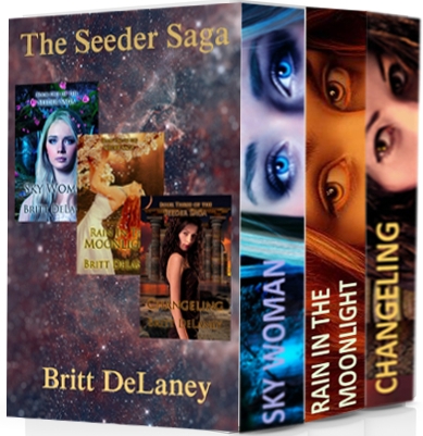 Three books in cardboard box cover on white